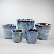 Blue ceramic pots in different sizes - ocean inspired indoor garden
